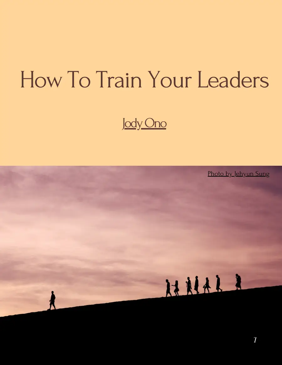 Opening page of 'How To Train Your Leaders' by Jody Ono with a silhouette of people walking up a hill at dusk
